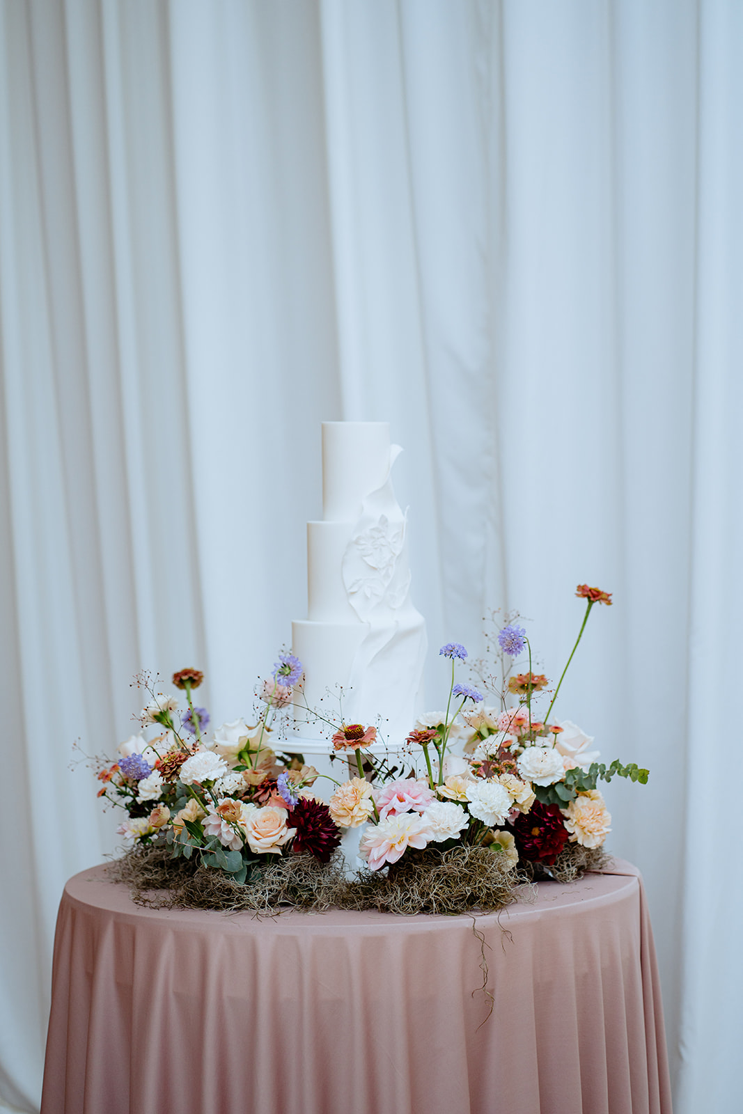 A table setting with wedding styling and silverware.