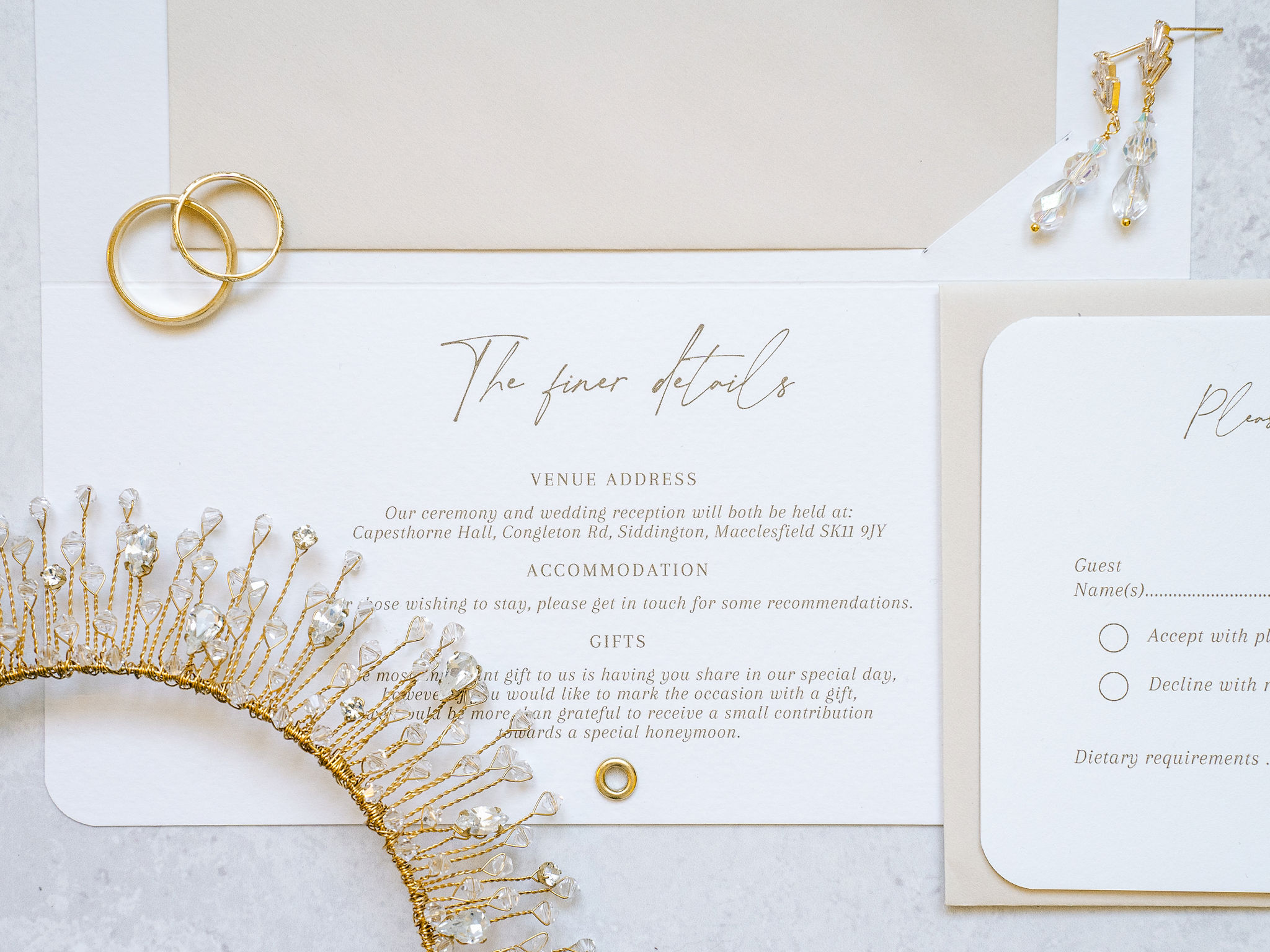 A colour image of wedding invitations for a wedding at Capesthorne Hall in Cheshire