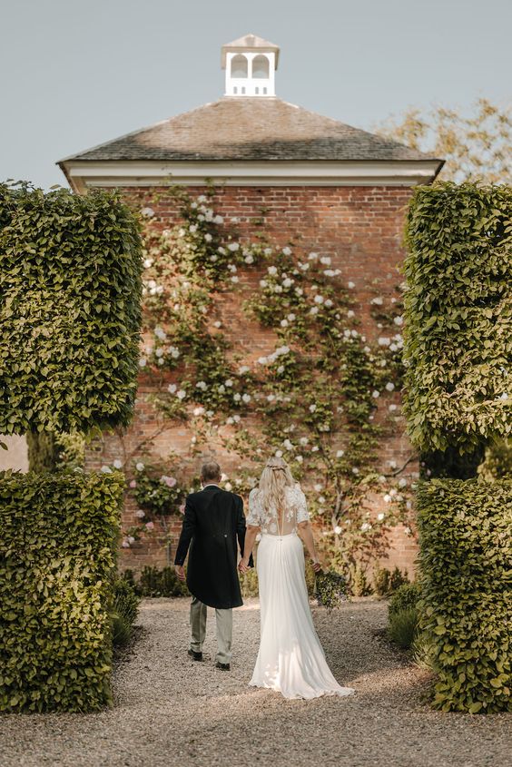 A colour image of a bride and groom at Iscoyd Park