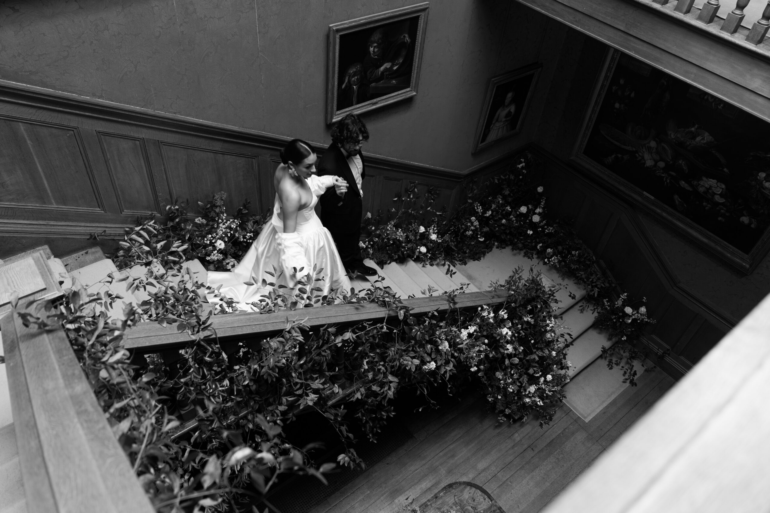 Birdsall House A black and white image of a married couple on the stairs at Birdsall House.