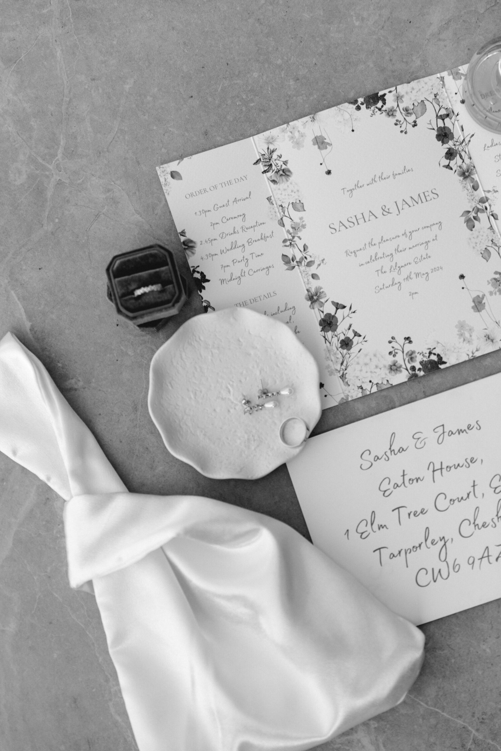 BESPOKE-WEDDING-STATIONERY-CHESHIRE A black and white image of a spring wedding invitation suite with delicate floral design.