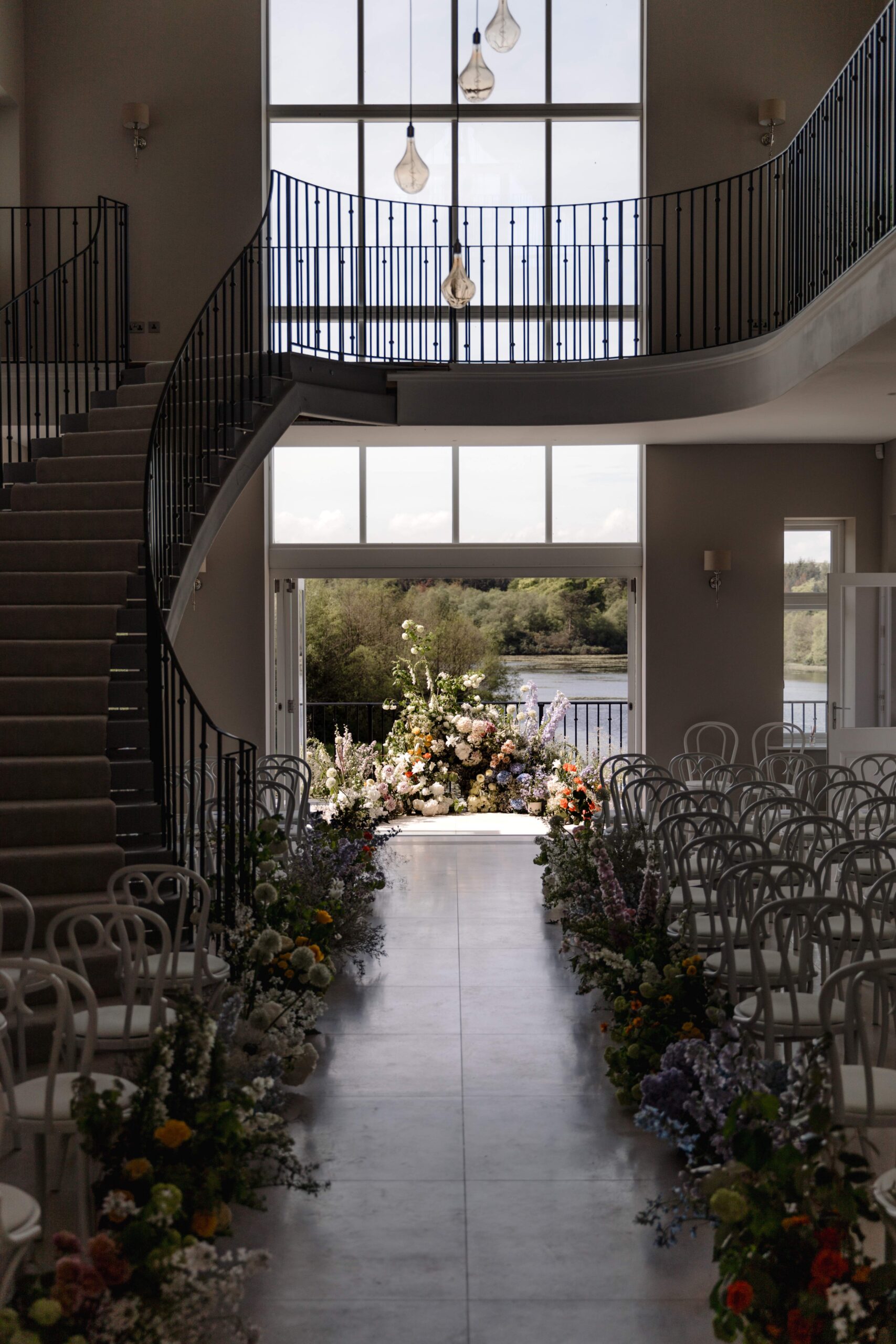 COTSWOLDS-WEDDING-FLORIST-AND-WEDDING-PLANNER A colour image of luxury marquee wedding floristry at a ceremony.