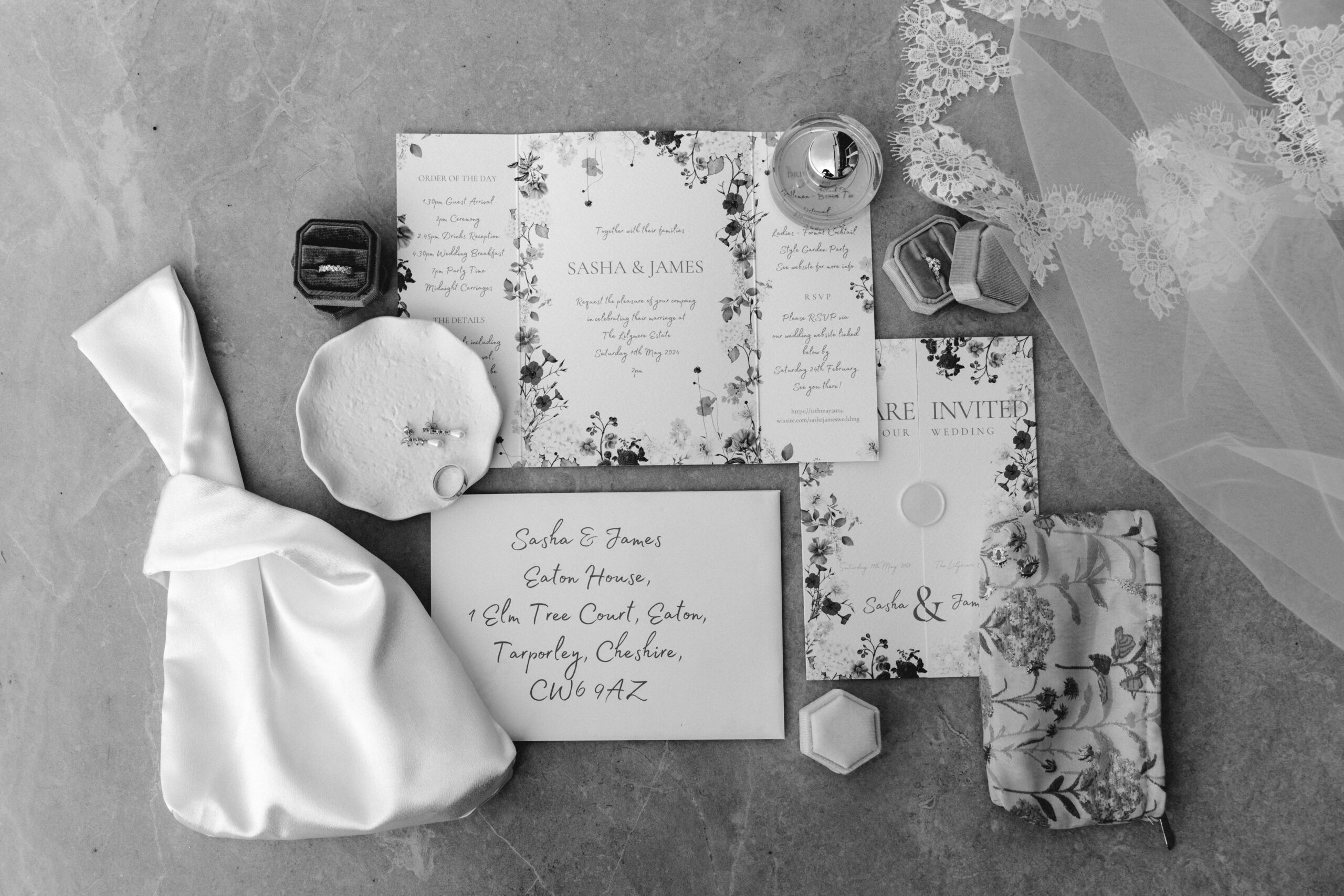 LUXURY-wedding-invitation-suite A black and white image of a floral wedding invitation suite for a marquee wedding.