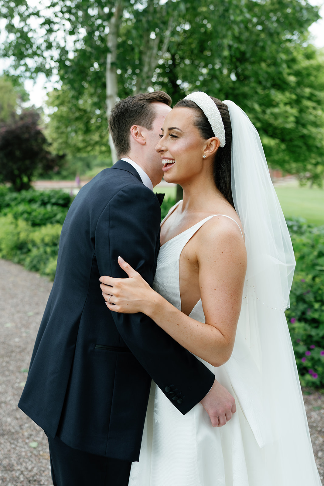 A colour image of bride and groom maddie and Chris on their wedding day at Capesthorne Hall in Cheshire.