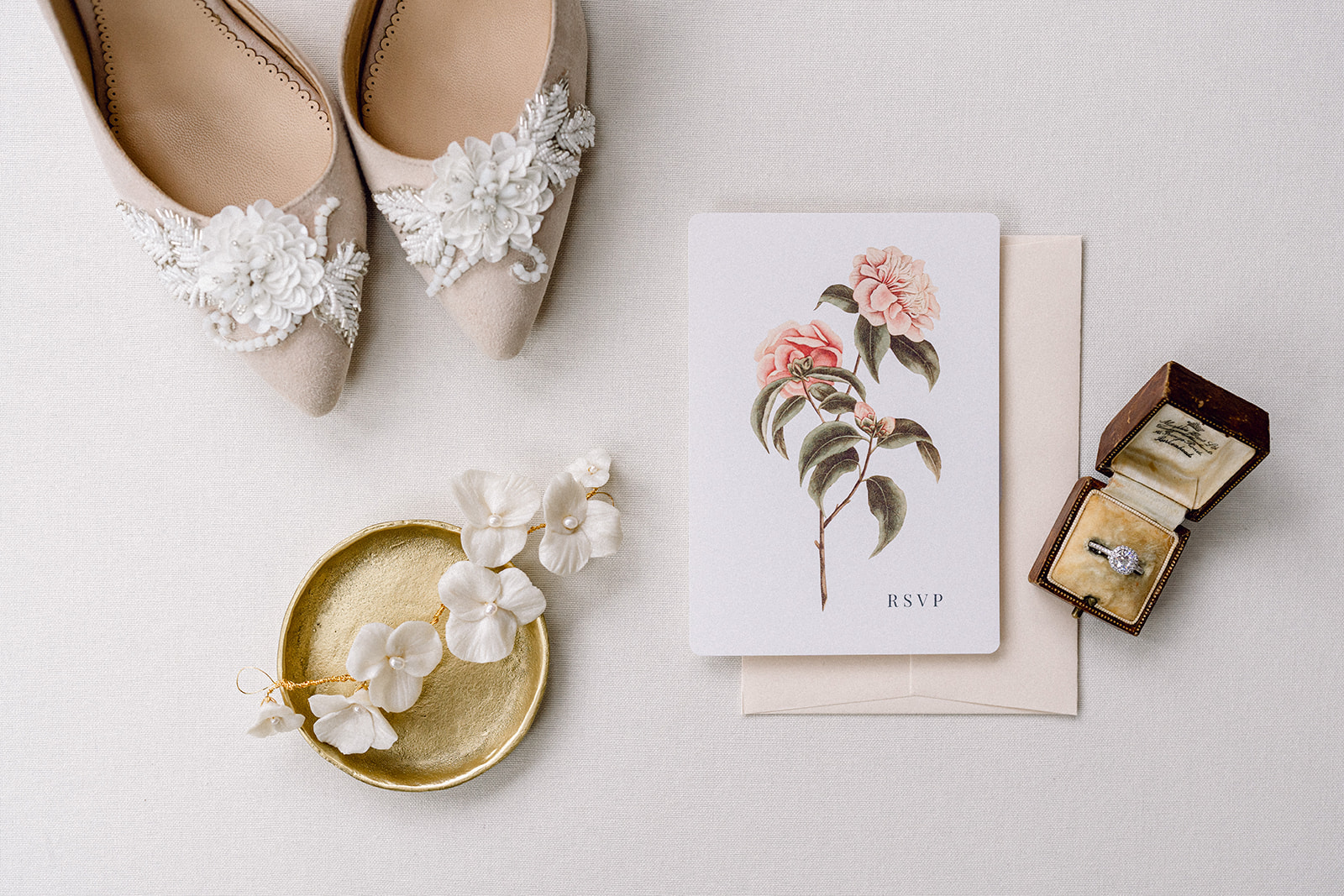 A colour image of bespoke wedding invitations for a marquee wedding in the Cotswolds.