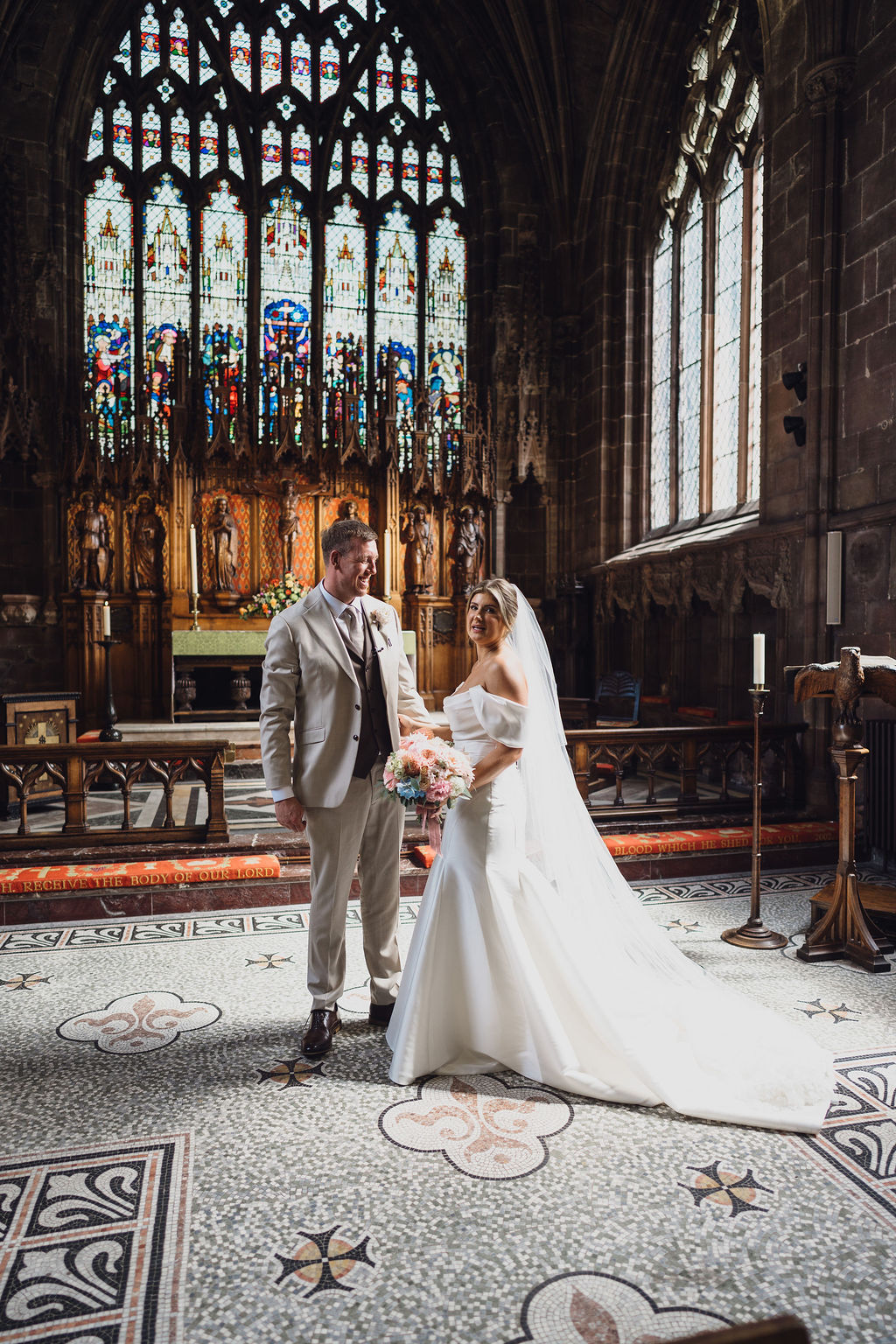 bride-and-groom-at-wedding-ceremony-nantwich-church-shropshire A colour image of a bride and groom after their wedding ceremony at Nantwich church.