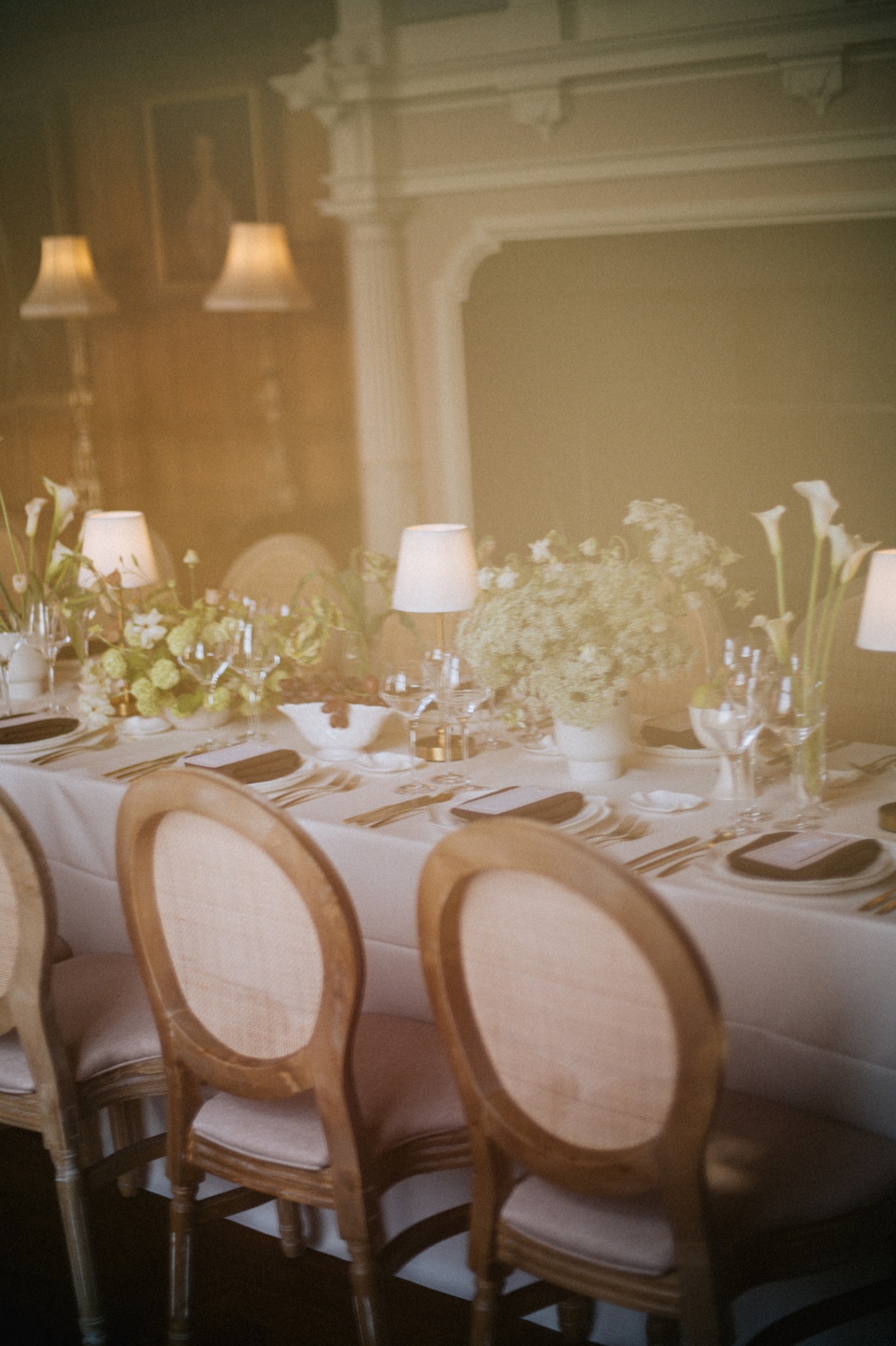 A colour image of wedding table styling by cotswolds wedding planner Soiree Studio at Combe End.