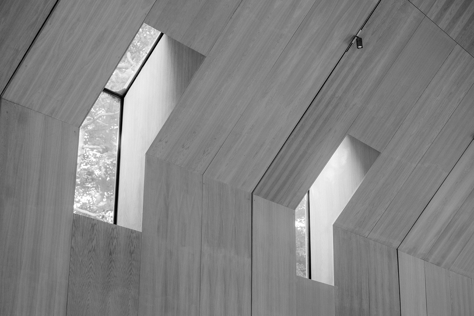 Amy and Jack A black and white image of the vast windows at Dorfold Hall in Cheshire with planning by soiree studio.