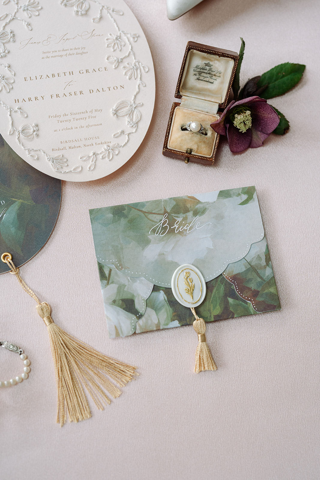 Birdsall House A colour image of bespoke hand made wedding invitation in a Bridgerton style by Soiree Studio.