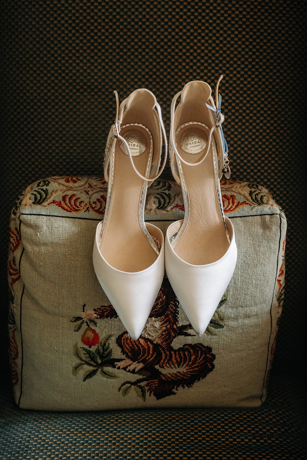 Amy and Jack A colour image of cream pointed bridal shoes at Dorfold Hall Luxury wedding venue.