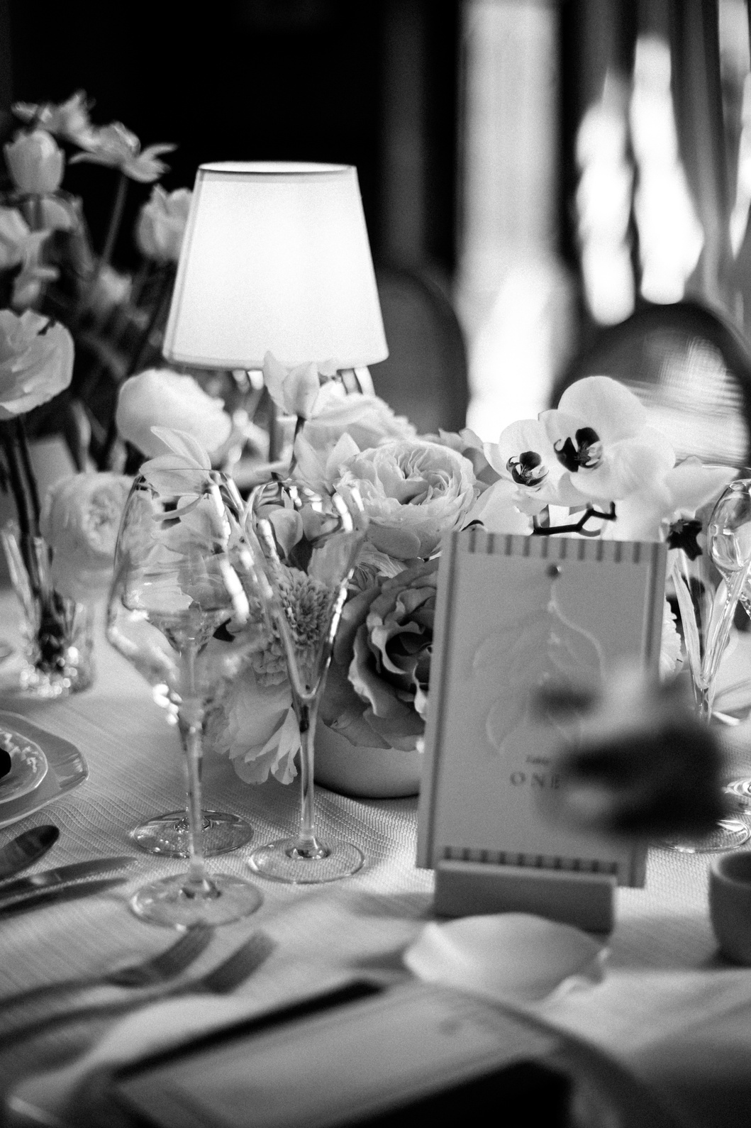 luxury-table-stationery-soiree-studio-uk A clack and white image of luxury hand embroidered wedding stationery by wedding planner soiree studio.