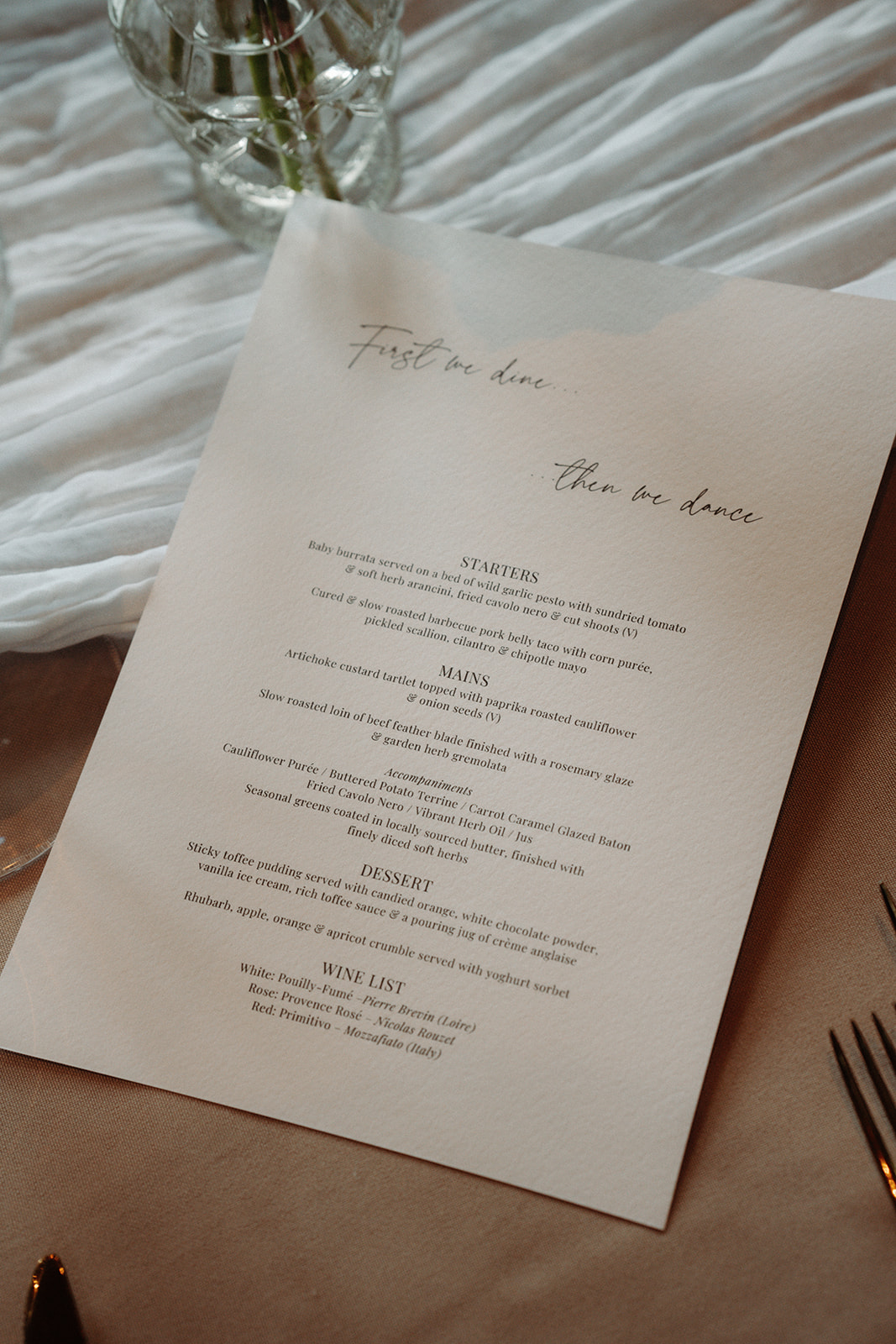 Amy and Jack An editorial style image of a wedding menu designed by Soiree Studio for a wedding planned at Dorfold Hall.