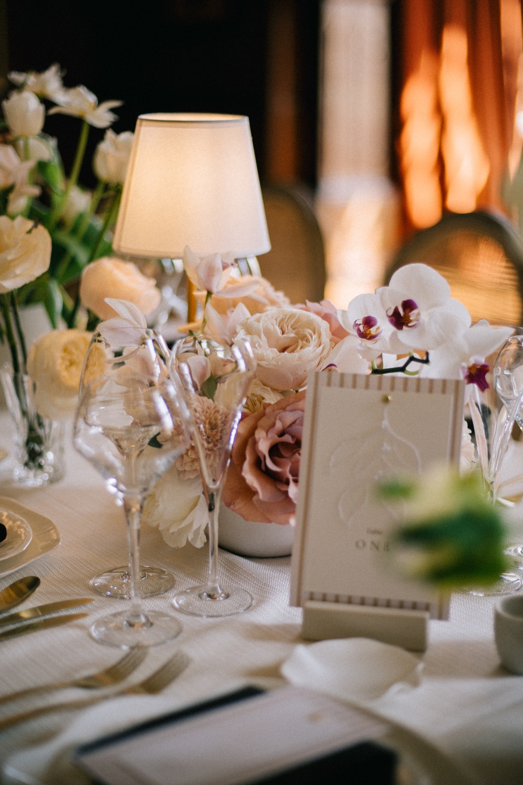 modern-wedding-ideas-cheshire-wedding-planner A colour image of a beautifully styled wedding table with fresh pink blush flowers, table lamps and hand embroidered wedding stationery by Soiree Studio.