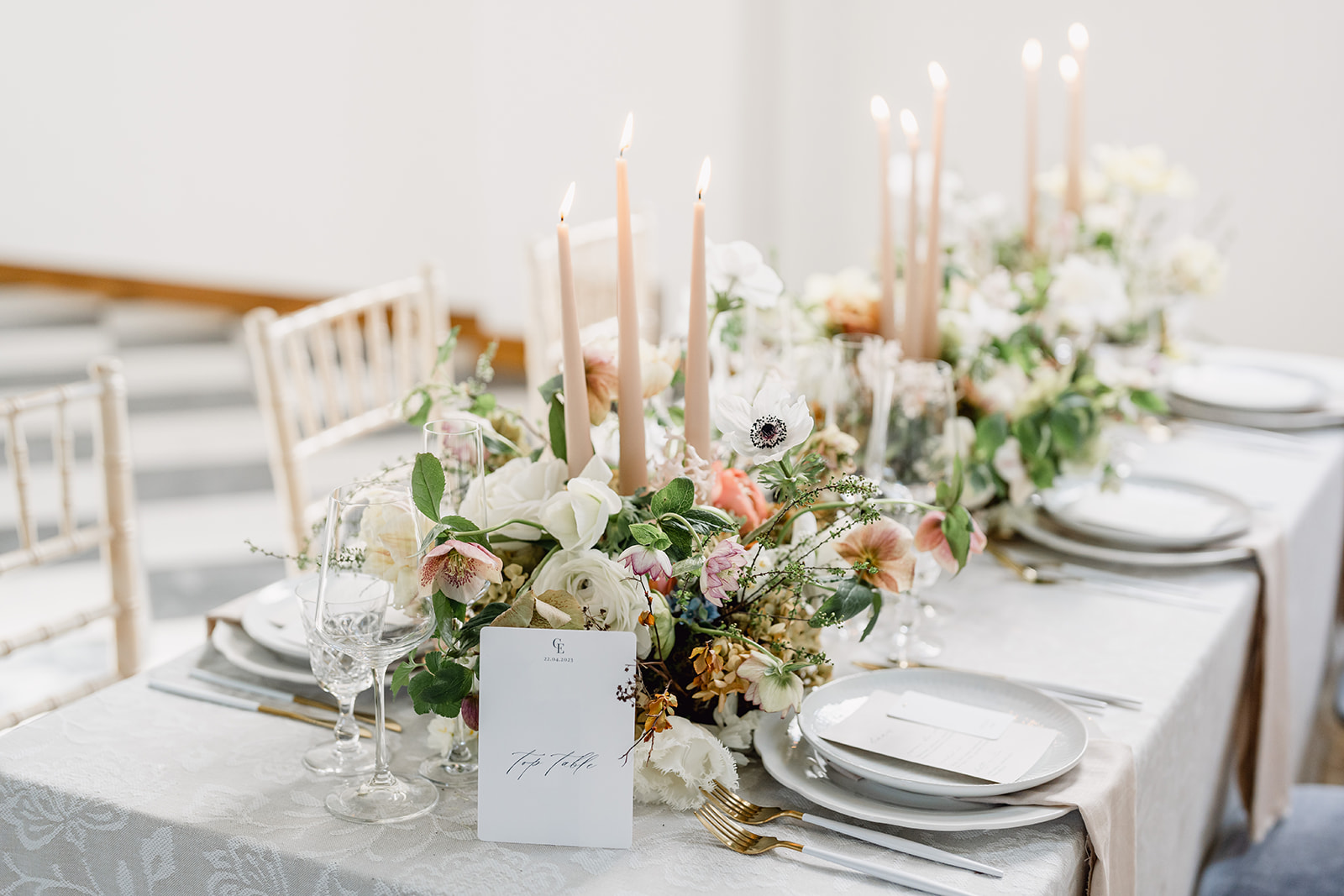A colour image of a wedding table styled for a spring wedding at Hawkstone Hall by Soiree Studio design led wedding planning.