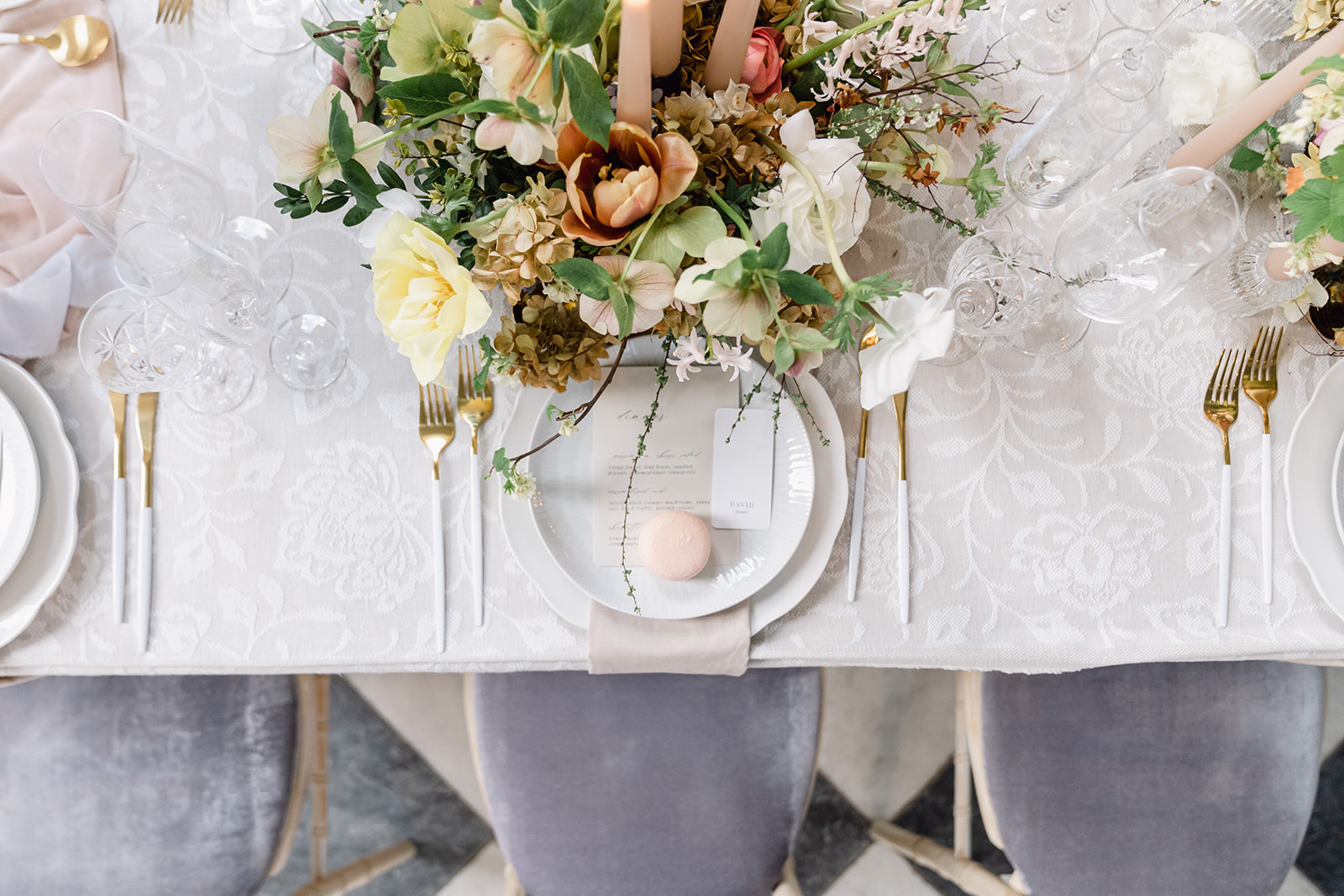 A colour image of spring wedding decor for a wedding planned by Soiree Studio at Hawkstone Hall.