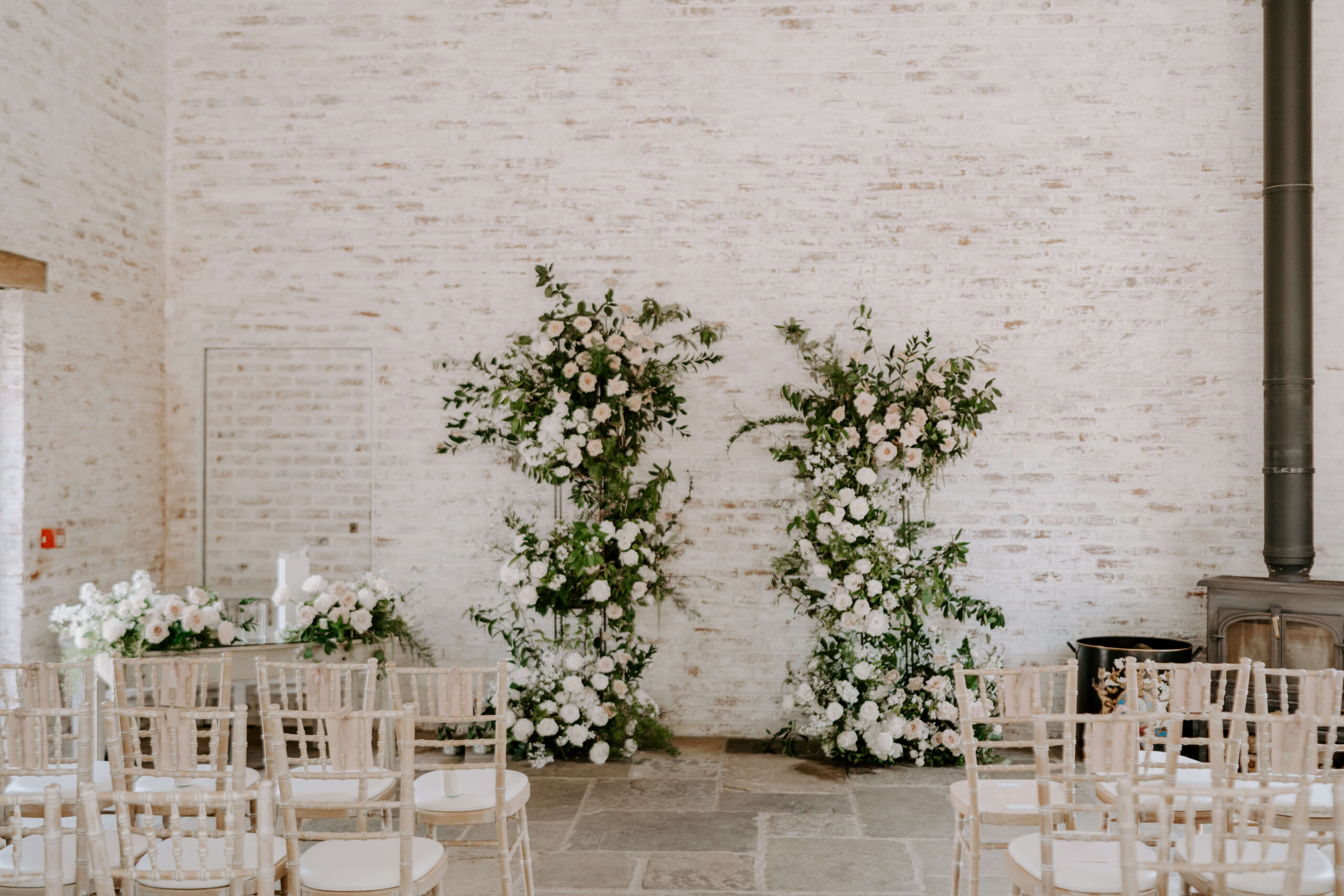 wedding-flowers-for-wedding-ceremony-cheshire A beautiful spring floral ceremony arch filled with blush roses and peonies for a ceremony planned at Dorfold Hall in Cheshire.