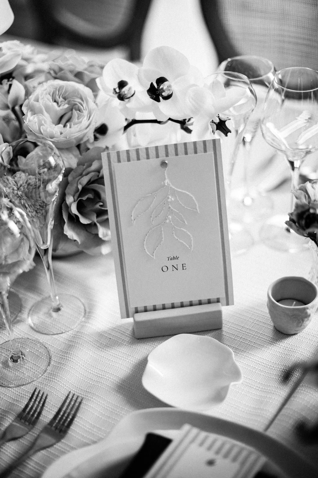 wedding-venues-in-cotswolds-luxury-wedding-planner A black and white image of hand embroidered wedding stationery by Soiree Studio in Cheshire.