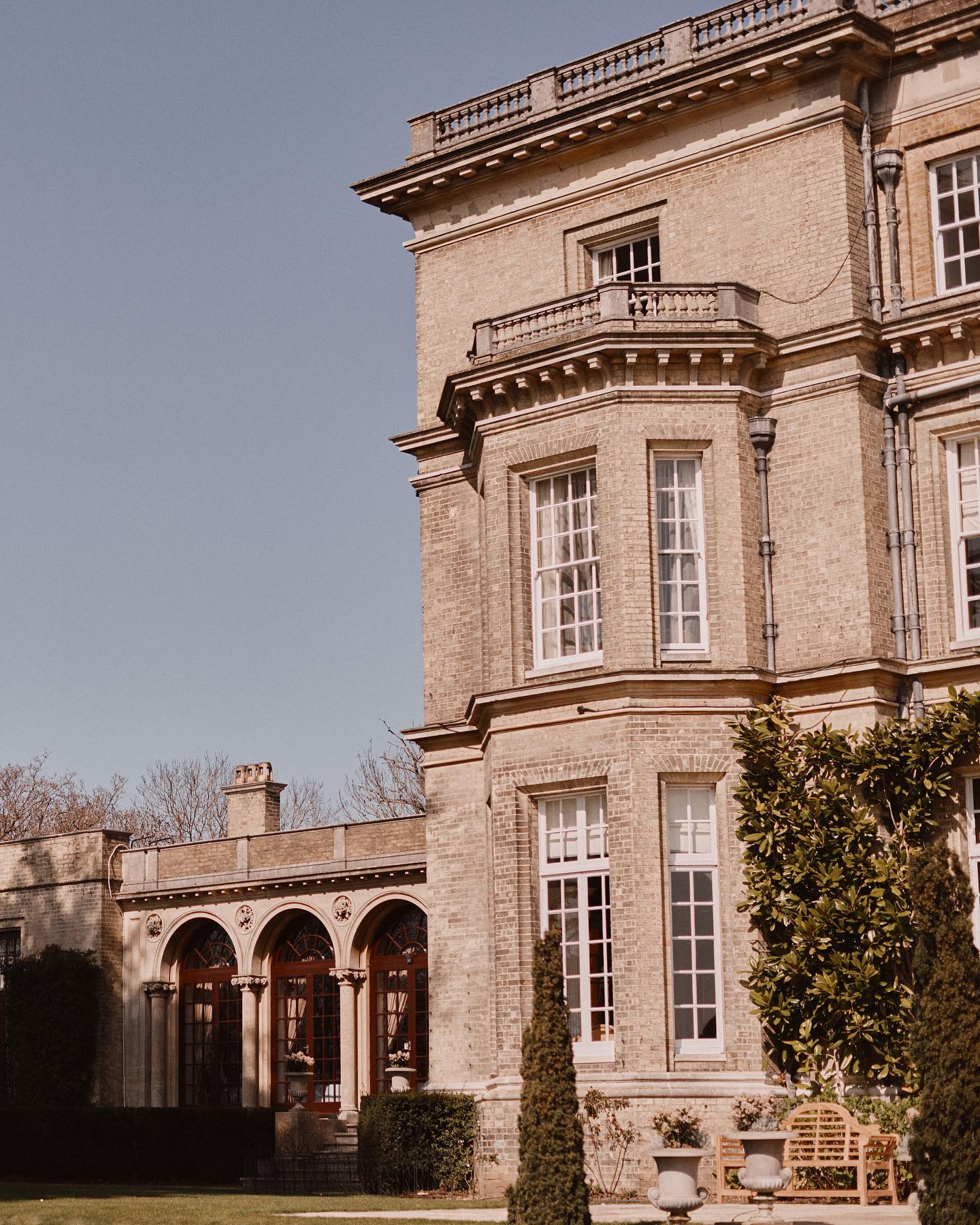A colour image of Hedsor House wedding venue in Buckinghamshire on a bright sunny day with blue skies.