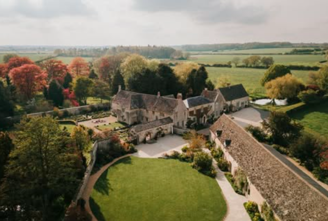 A colour image of an arial view of Caswell Manor Wedding Venue in the Cotswolds. 