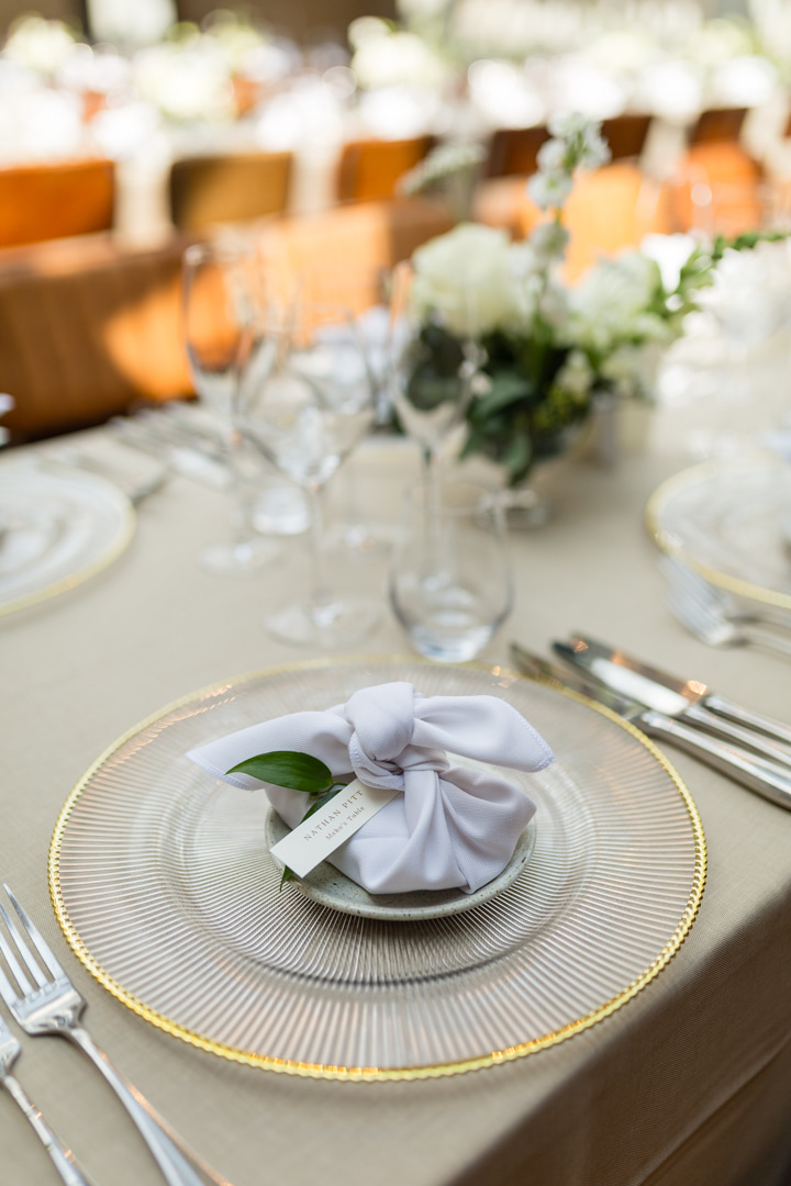 A colour image of a wedding table at Hampton Manor wedding venue styled by UK wedding planner Soiree studio.