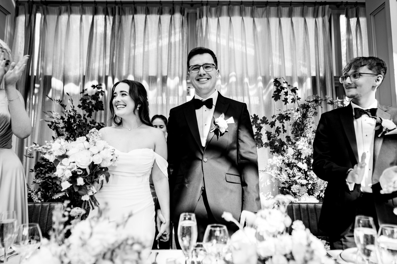 A colour image of summer floral wedding stationery in blush pinks and peaches at a marquee wedding in Shropshire