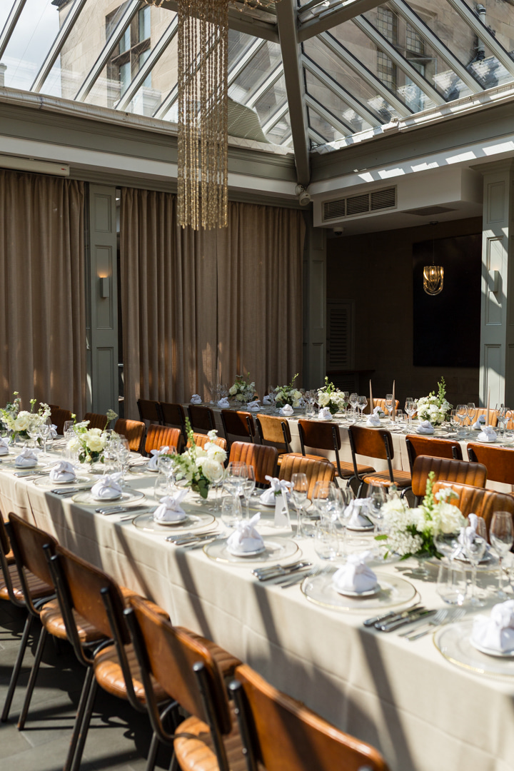 A bride talking to her guests at her marquee wedding in Shropshire.