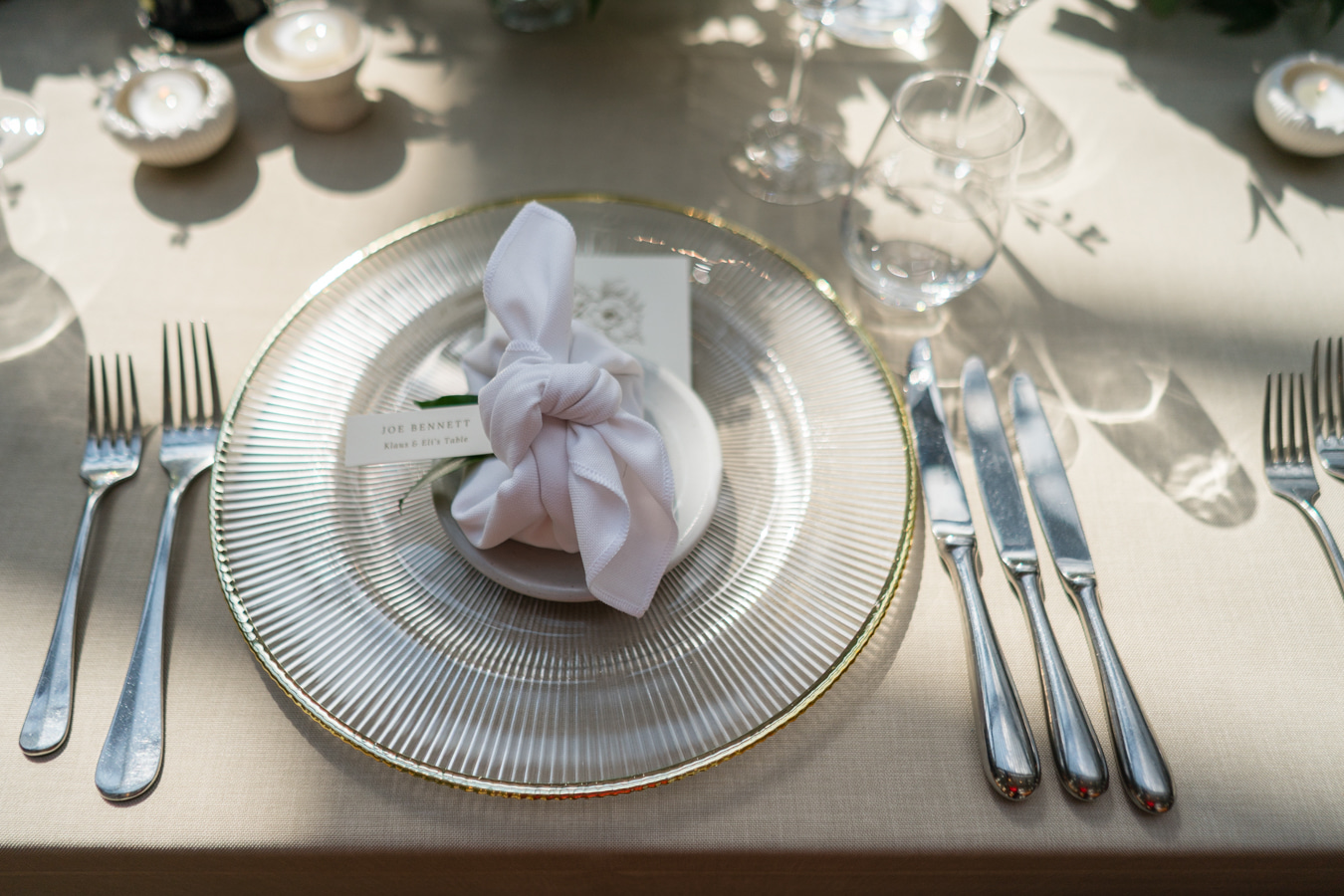 A colour image of a place setting designed by UK wedding planner Soiree Studio.