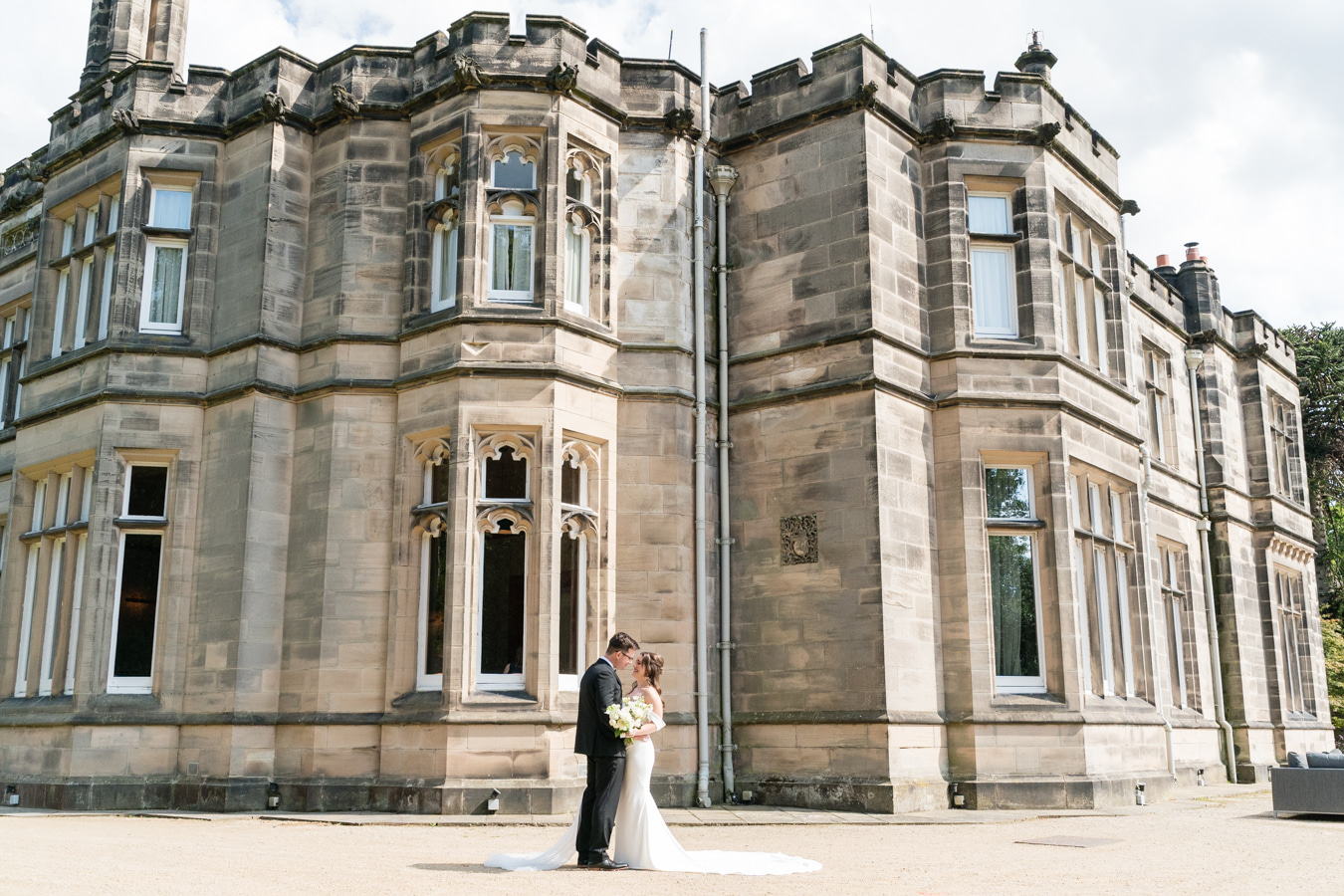 A colour image of the front of Hampton Manor UK wedding venue planned by Soiree Studio.