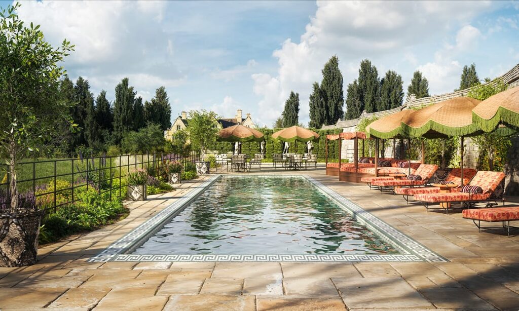 A colour image of Kin House wedding venues outside space with pool in the summer time. A perfect exclusive-use wedding venue near the Cotswolds.