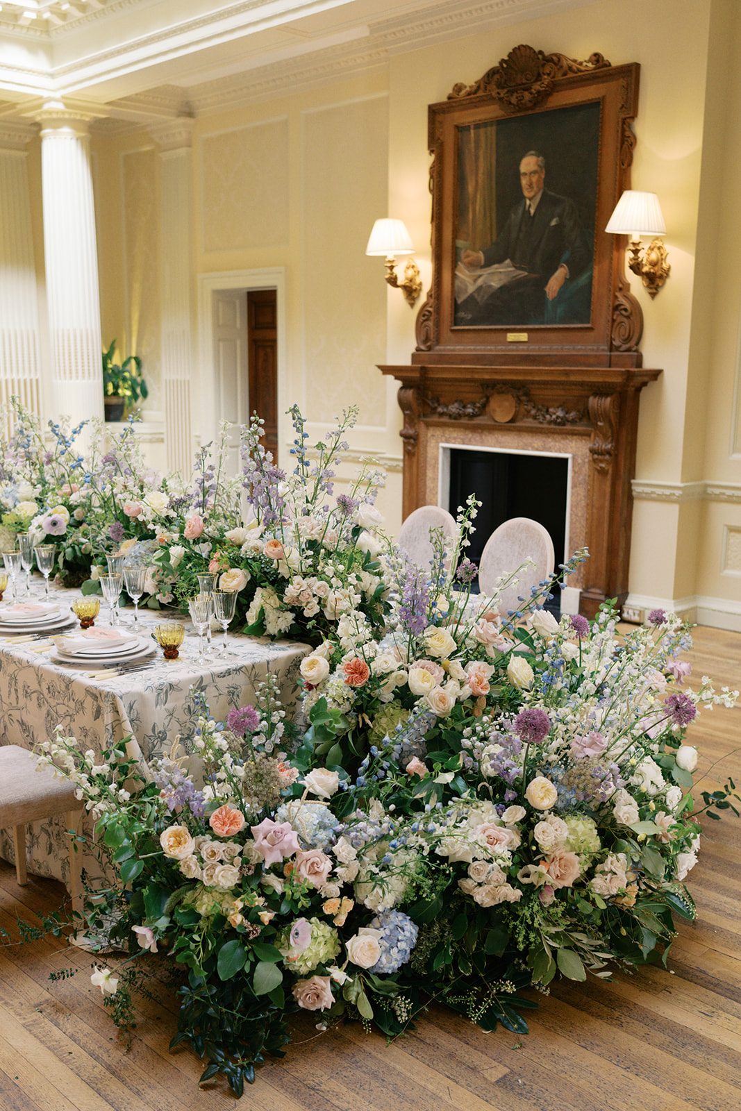 A colour image of spring flowers at a wedding at Kin house wedding venue UK Designed by Soiree Studio