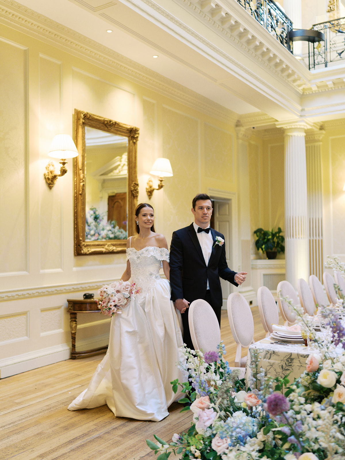 A colour image of a bride and groom at UK wedding venue Hedsor House.