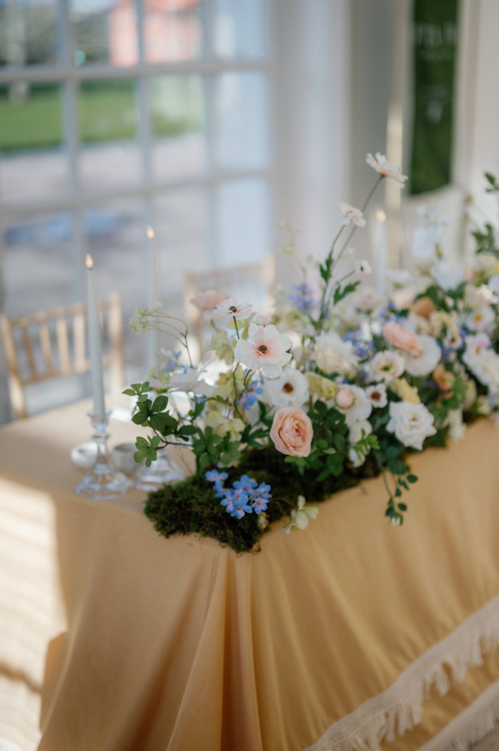 A colour image of a spring pastel ttablescape at Kew Gardens wedding venue UK.