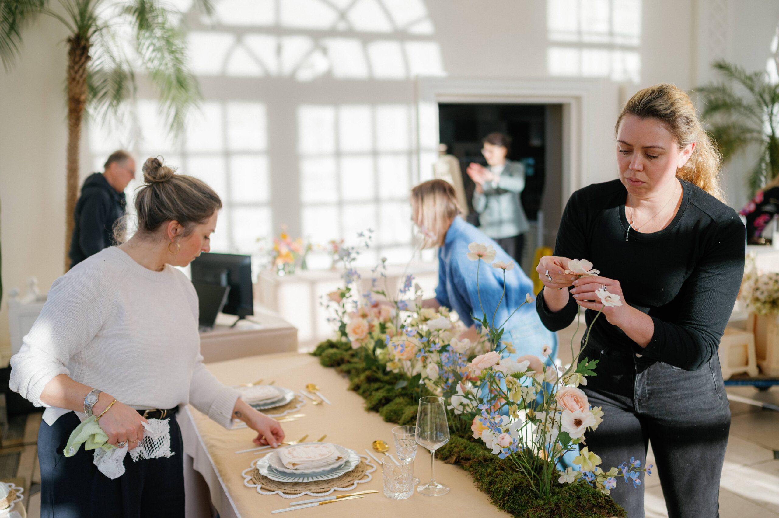 An images of wedding planner soiree studio, setting up for a wedding at Kew Gardens UK. 