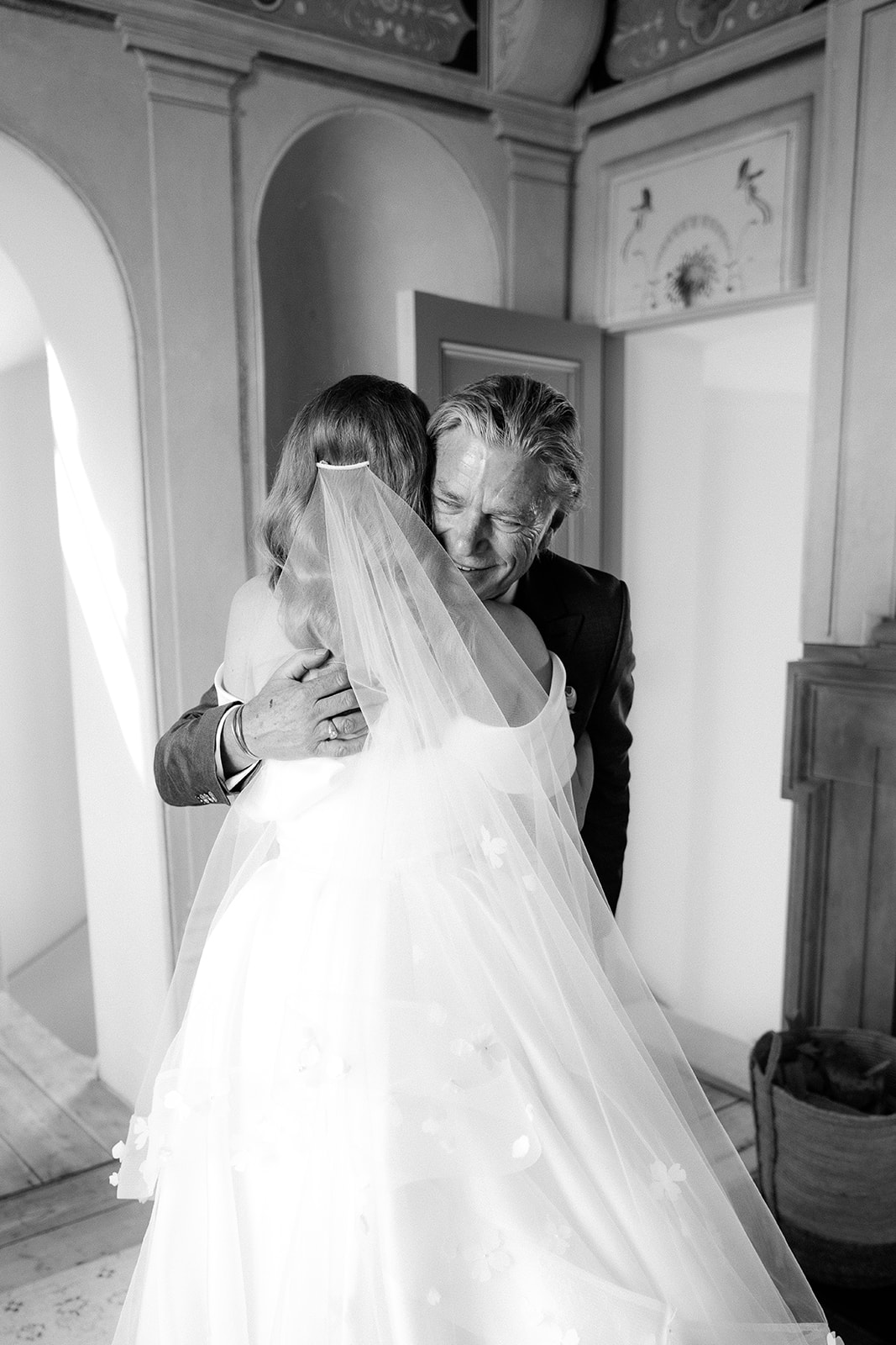 A colour image of a bride and groom at UK wedding venue Hedsor House.