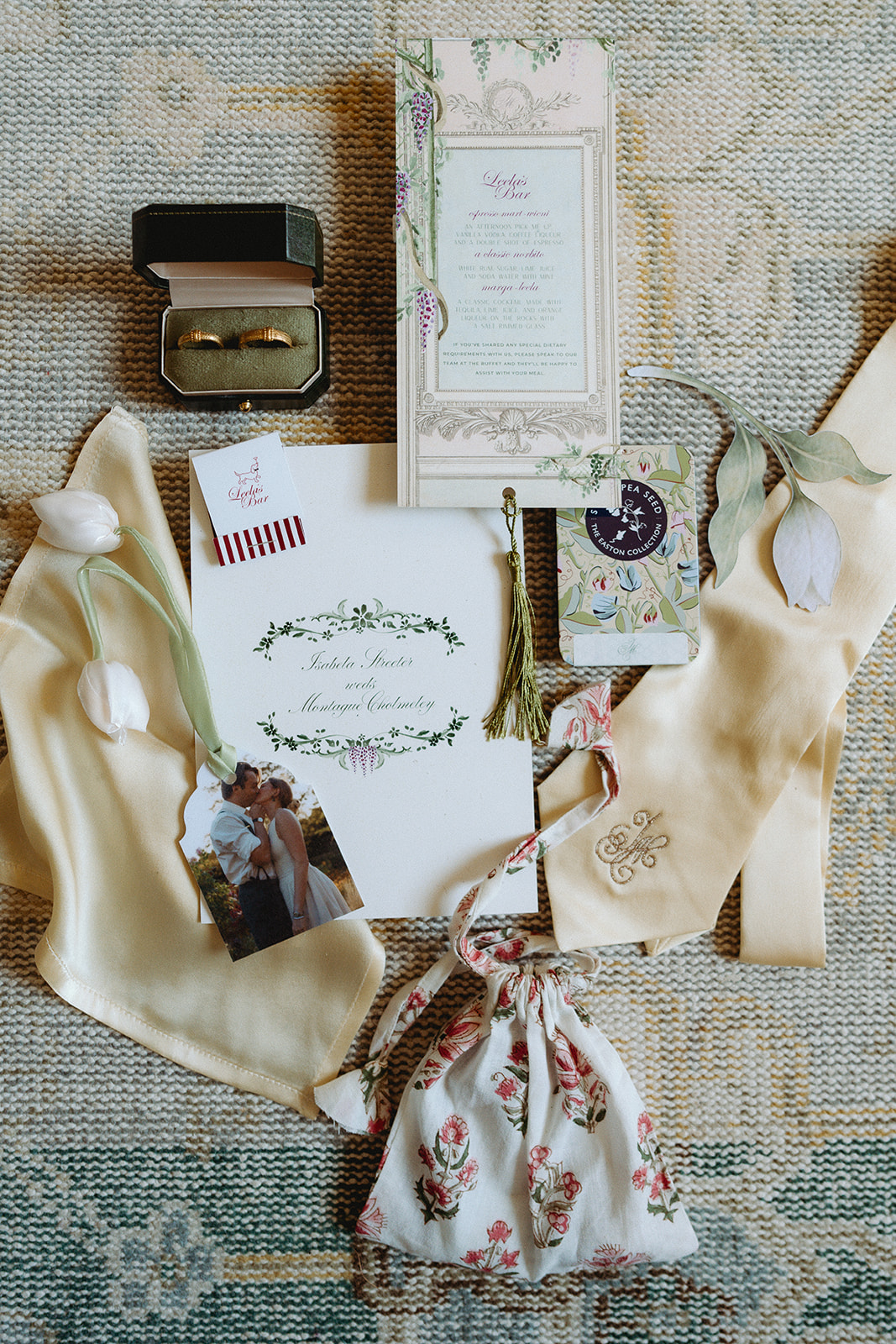 A colour image of a place setting for a wedding with spring flowers by Soir&eacute;e Studio at Hedsor House.